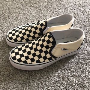 Brand new never worn Vans slip on sneakers